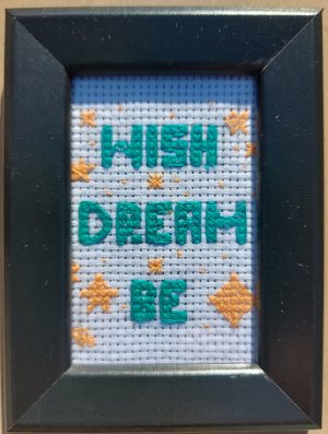 Wish, dream, be. Framed in black.