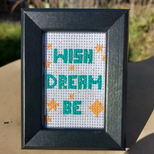 WISH, DREAM, BE framed in black